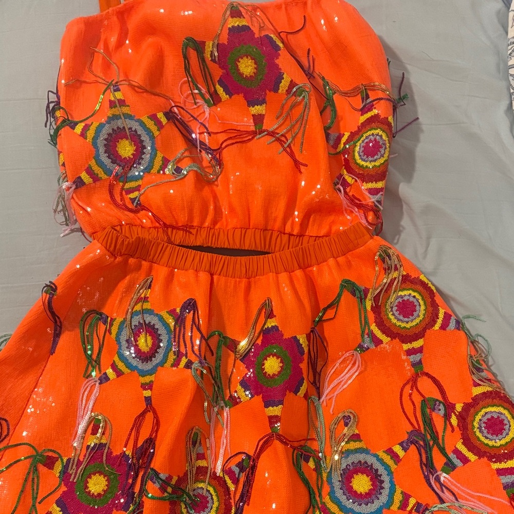 QUEEN OF SPARKLES… Piñata skort and top. Both size Large..